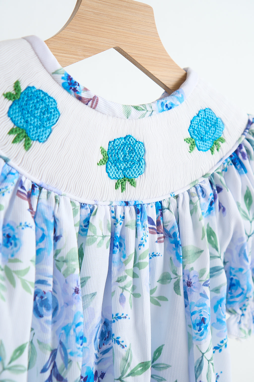 Blue Rose Print Hand Smocked Girl Romper